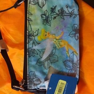Disney Tinkerbell purse tags are still on it never been used.